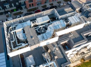 Ventilation and air conditioning system on the roof of the house. View from above